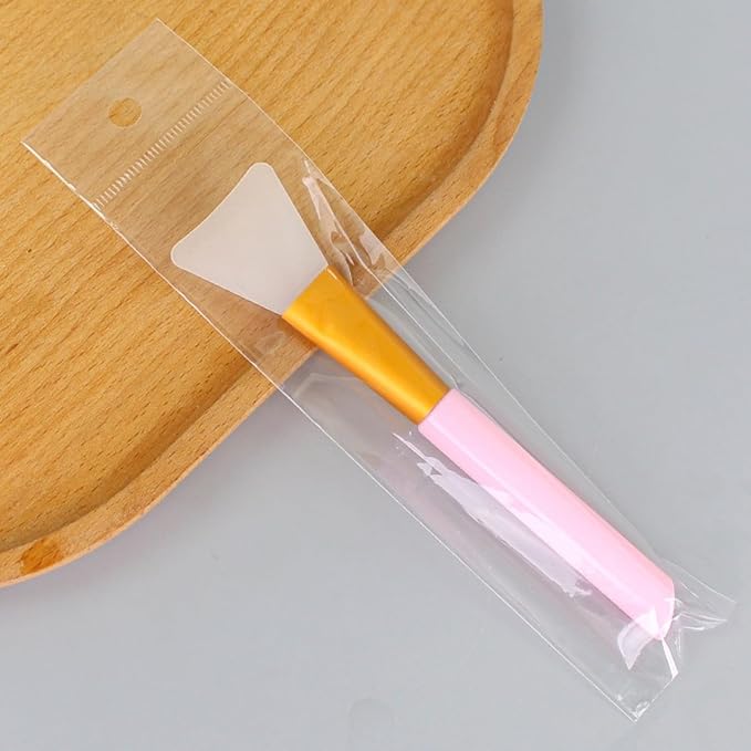 Pink silicone brush